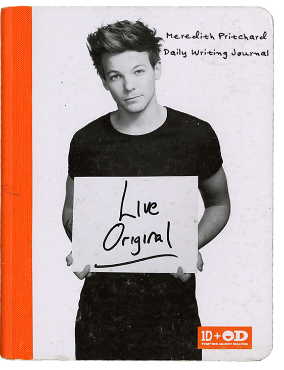 cover of an orange one direction composition notebook